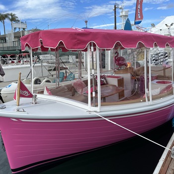 Pink boat for private parties in San Diego.